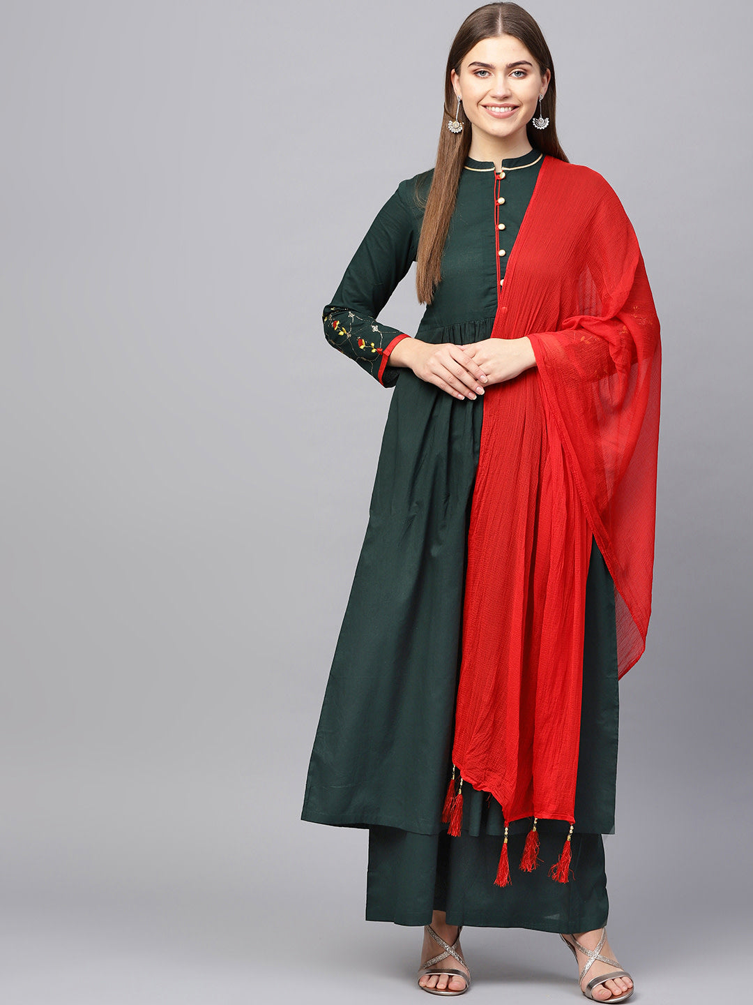 Women Green solid kurta with palazzos - NOZ2TOZ