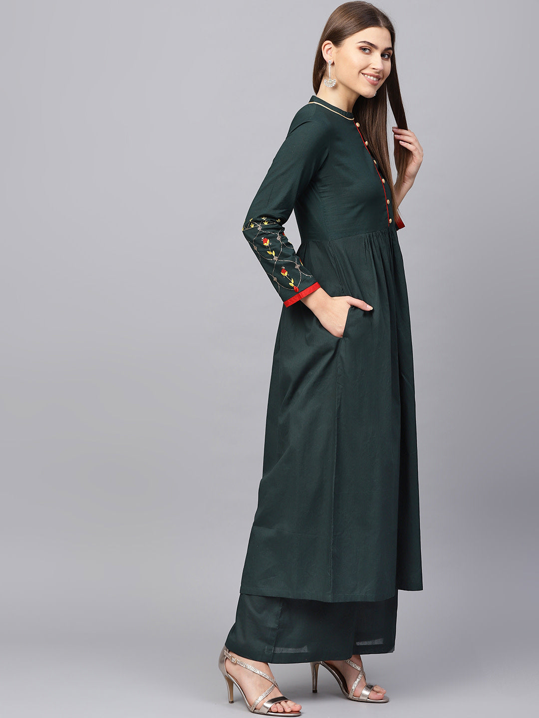 Women Green solid kurta with palazzos - NOZ2TOZ