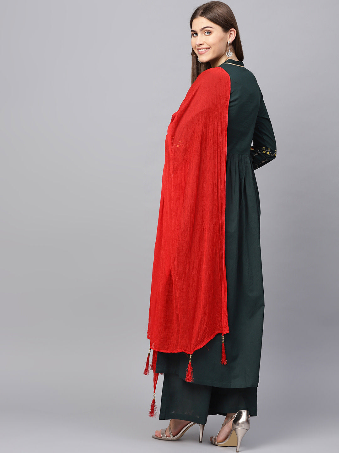 Women Green solid kurta with palazzos - NOZ2TOZ